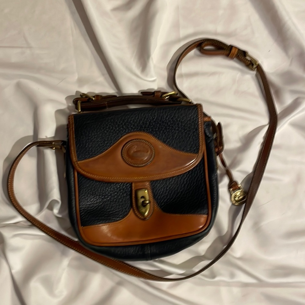 Vintage Dooney & Bourke All Weather Leather. Crossbody app 9x8x2.5 blue & Tan